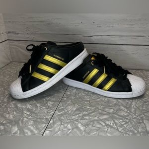Adidas Superstar Black and metallic gold mules. Worn once. Great shape.